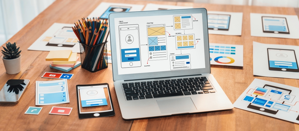 Website wireframes on a laptop