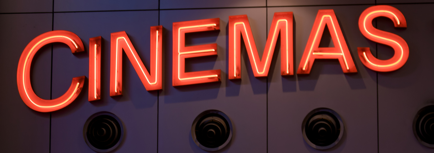 Neon Sign saying CINEMAS